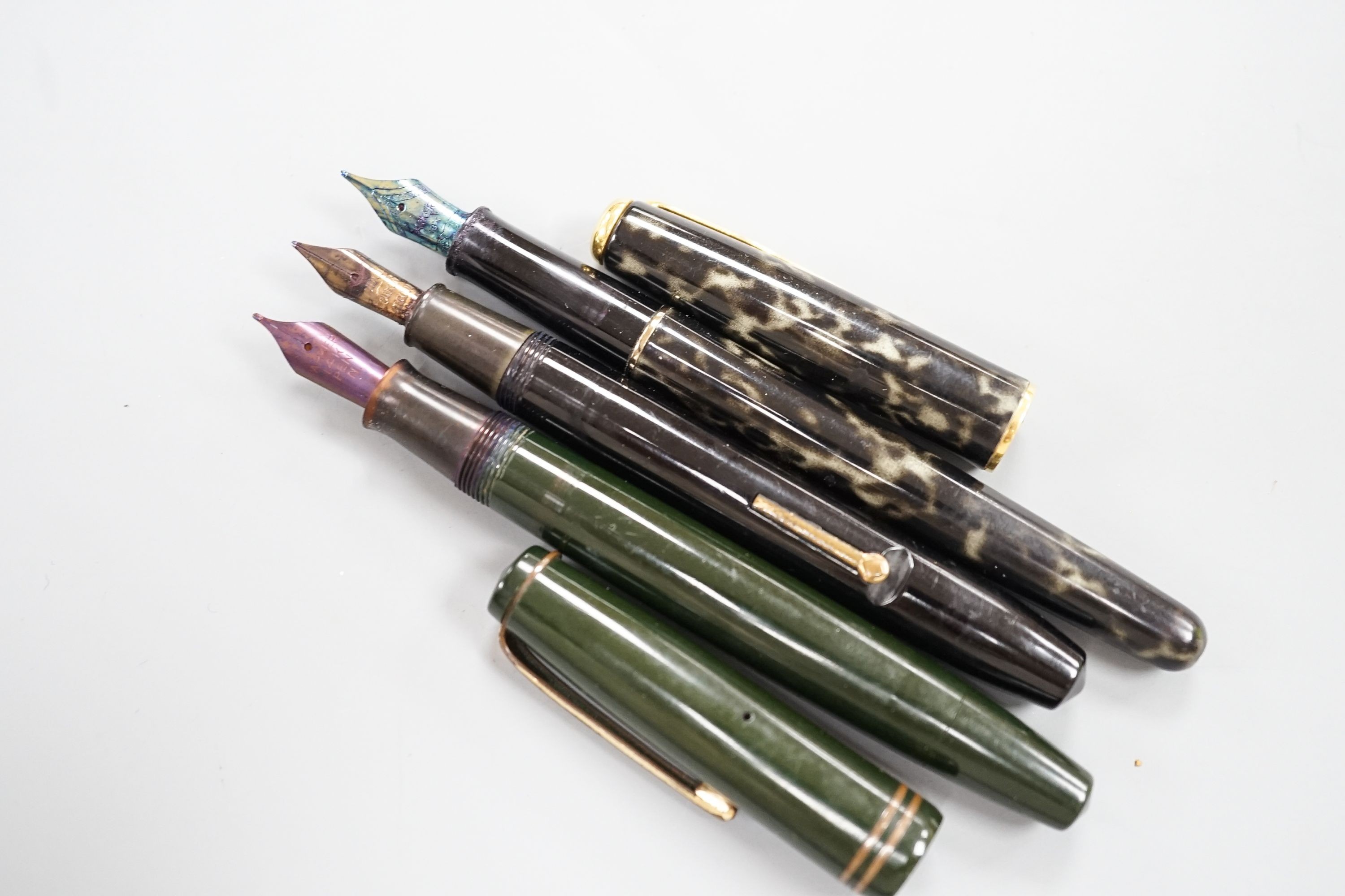 Three assorted fountain pens, to include, Conway Stewart, Parker Victory and Parker Sonnett with 18ct nib.